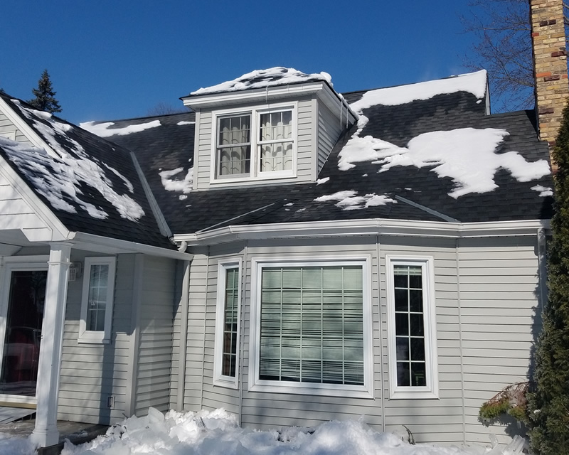 After Roof Snow & Ice Dam Removal After Roof Snow Removal